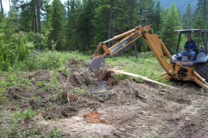 backhoe digging soil